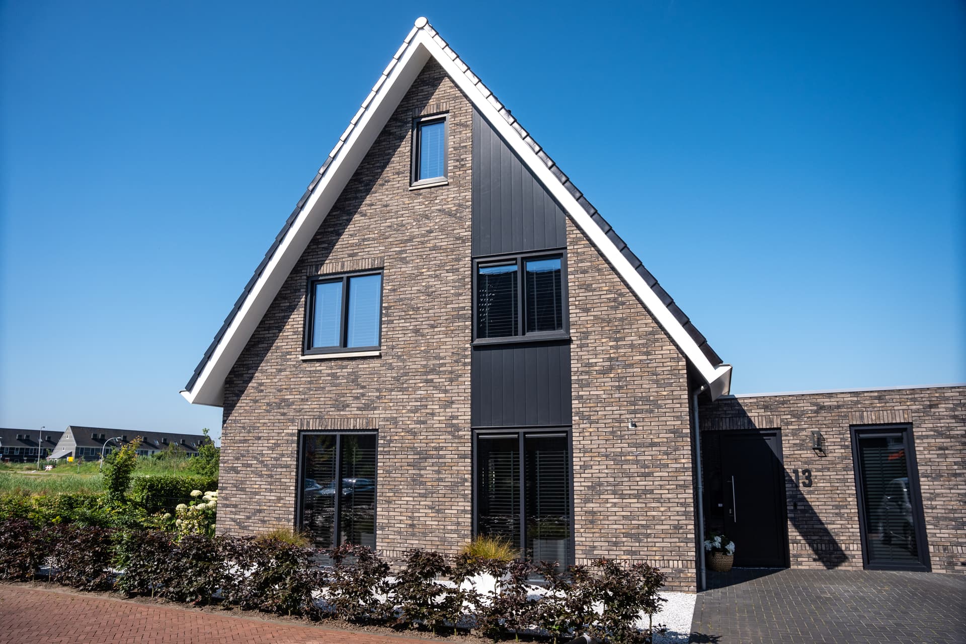 Woonhuis met verticale Keralit gevelbekleding